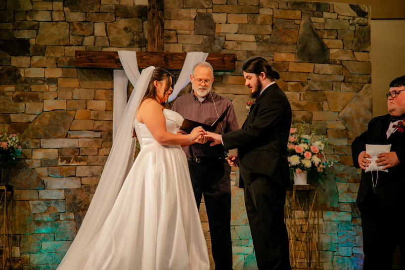 Wes officiates a wedding for his former students.  