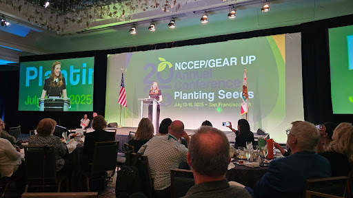 Corinne Smith delivers remarks while accepting the GEAR UP Professional of the Year award in 2025.