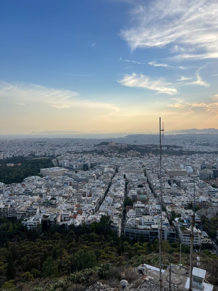 View of Athens, including the Acropolis and the Saronic Gulf (part of the Aegean Sea) from the vista of Mount Lycabettus.